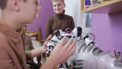 Kids playing with robots Stock Footage 182849216