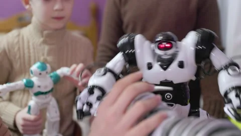 Kids playing with robots Stock Footage 186931808
