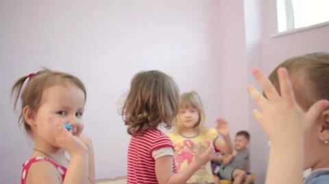 Kids playing running around dancing in kindergarten and laughter 스톡 동영상 62198911