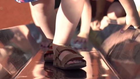 Kids playing on the slide , climbing  Stock Footage 79976241
