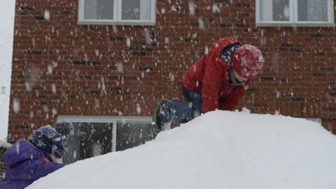 Kids playing with snow Stock Footage 149456966