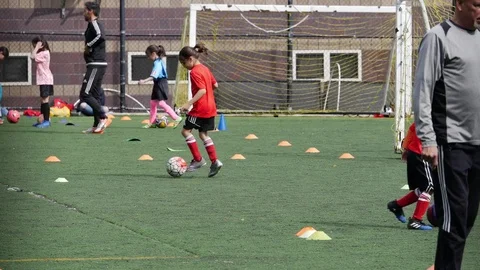 Kids playing soccer Stock-Footage 77552568