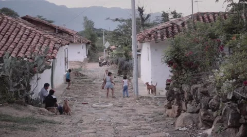 Kids playing on the streets Stock Footage 65772002