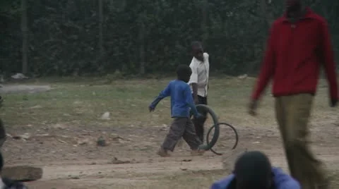 Kids playing with tires Stock Footage 11491380