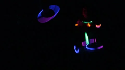 Kids quickly wave glow sticks in the dark Stock Footage 40213228