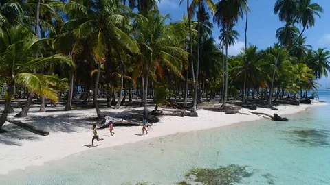Kids run on the beach Stock Footage 101744582