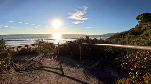 Kids running down to beach Stock Footage 300149362