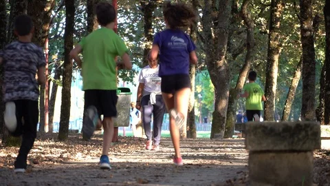 Kids running in park Stock Footage 117922400