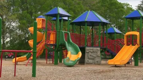 Kids running to playground Stock Footage
