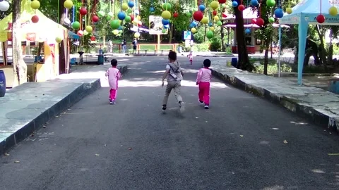 Kids running on playground Stock Footage 168083362