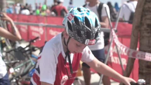Kids running in transition area and prepare for the next race course at IRONK Stock Footage 155927853