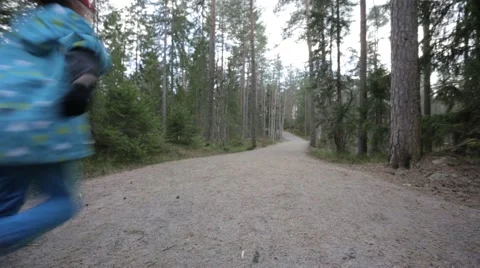 Kids running wild on a hiking path Stock Footage 63200431