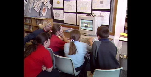 Kids at School Learning Personal Computers (1998)  Stock Footage 310223819