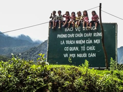Kids on sign 스톡 사진