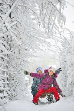 Kids sliding Stock Photos
