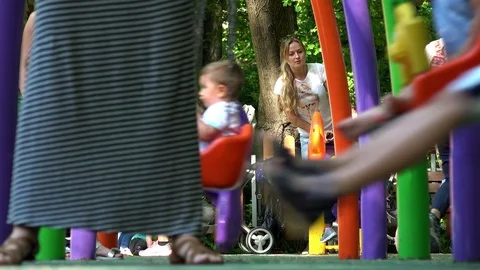 Kids on a swing At The Playground Vidéo 90247144