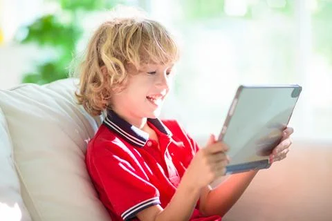 Kids with tablet computer. Stock Photos