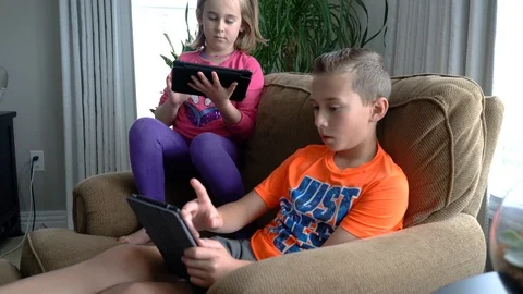 Kids on tablet computers Stock Footage 127536693