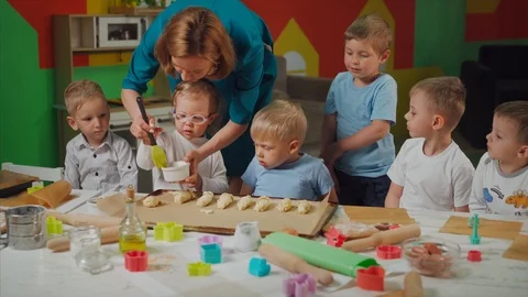 Kids trying cook for first time Stock Footage 108493921