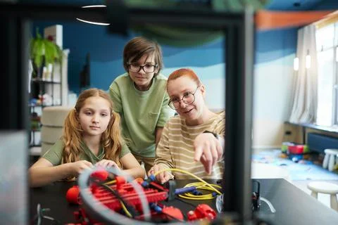 Kids using 3D Printer in Engineering Laboratory Stock Photos