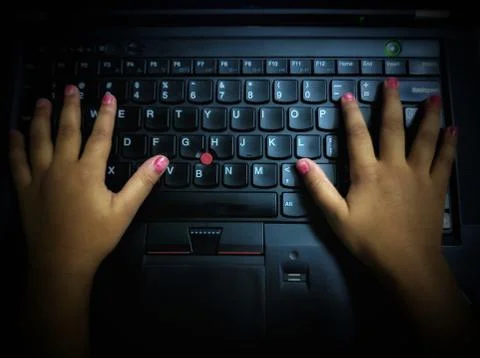 Kids using the laptops Foto stock