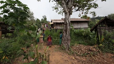 Kids using an old tyre as swing, Mount Victoria, Chin State, Myanmar Stock Footage 123704198