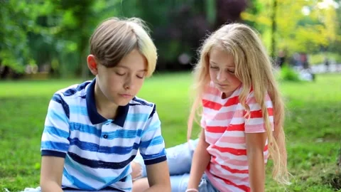 Kids using smart watch tapping touch screen looking up. Shot for animation. Mock 스톡 동영상 137745213