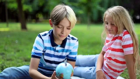 Kids using smartwatch tapping touchscreen looking up. Shot for animation. Mock 스톡 동영상 137628731