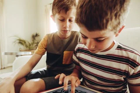 Kids using tablet pc for learning art Stock Photos