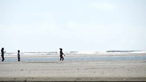 Kids walking on beach Stock Footage 126658722