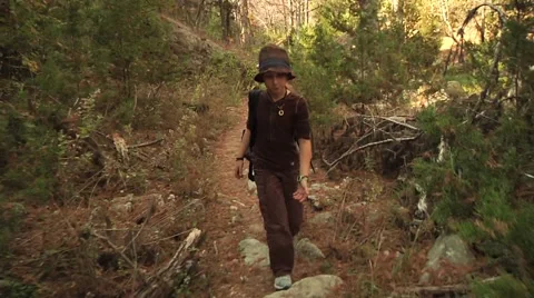 Kids walking through a forest Stock Footage 57359702