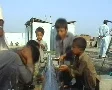 Kids Washing themselves at Refugee Camp SD Footage
