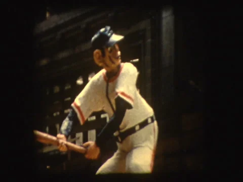 Kids waving on baseball float in 1961 Parade Stock Footage 1065440