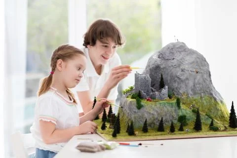 Kids working on model building project for school Fotos de archivo