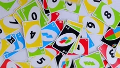 Uno Game Cards Scattered All Over the Frame and One Card Showing the Reverse  Side with Uno Logo Close-up Editorial Photo - Image of shedding, yellow:  144396811