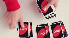 Uno Game Cards Scattered All Over the Frame and One Card Showing the Reverse  Side with Uno Logo Close-up Editorial Photo - Image of shedding, yellow:  144396811