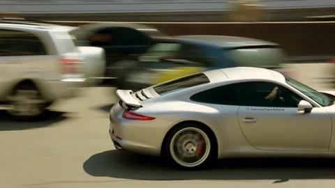 Kiev, Ukraine - May 22, 2021: Porsche 911 rides in the city. Porsche in motion Stock Footage 154681953