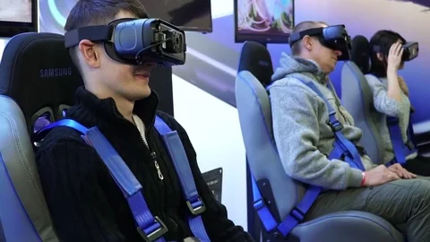 Kiev, Ukraine, October 7, 2017: People in virtual reality glasses are Stock Footage 80963460
