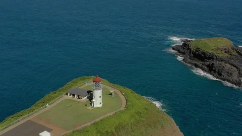 Kilauea Lighthouse on its point above the sea, Kauai Vídeos de archivo 96046498