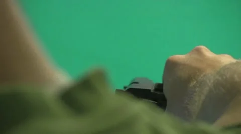 Kill Shot on the green screen with pistil Stock Footage