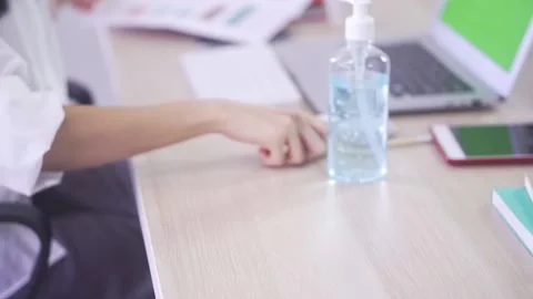 Kill virus at hands using alcohol gel. To prevent the disease of Covid 19 Stock Footage 133030293