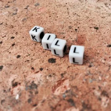 Kill white letters Stock Photos