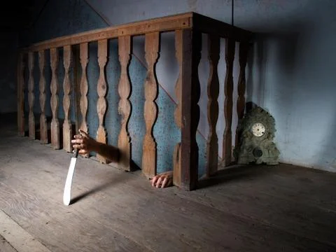 Killer in the basement Stock Photos