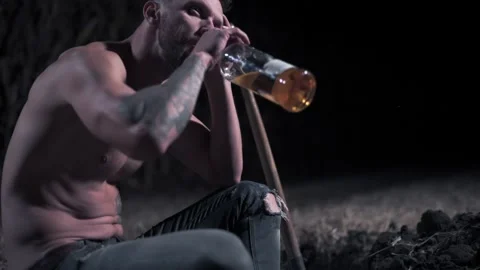 Killer digs grave at night. Stock Footage 162119548