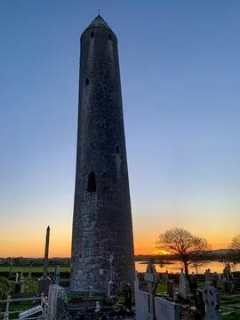 Kilmacduagh Round Tower at Sunset Stock Photos