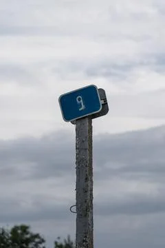 A kilometer marker by the road. 9th kilometer, road sign Stock Photos