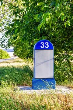Kilometer pole Stock Photos