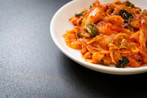 Kimchi cabbage on plate Stock Photos