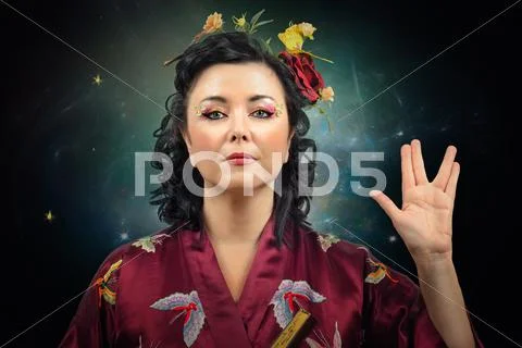 Kimono woman showing spoke sign Stock Photos