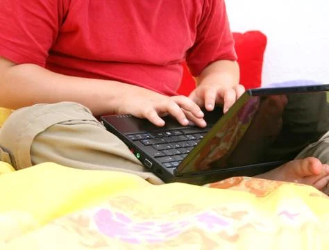 Kind am Computer Stock Photos